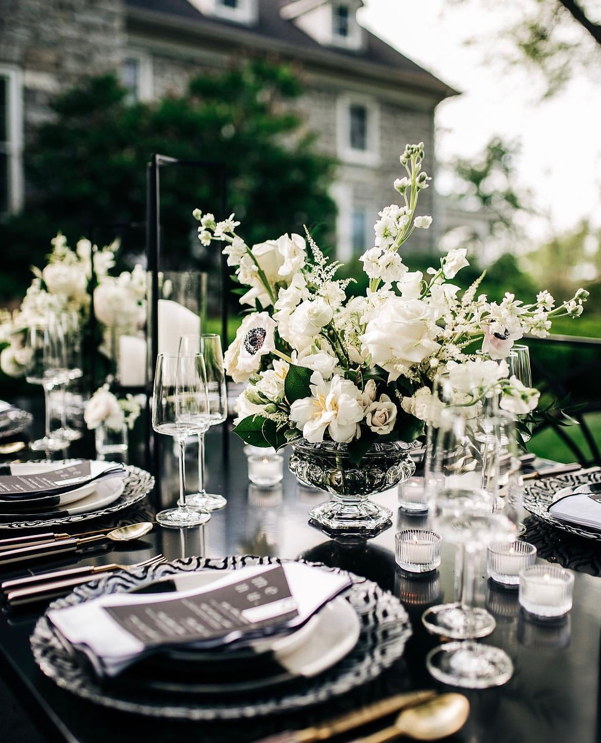 Black and white tablescape with white flowers
